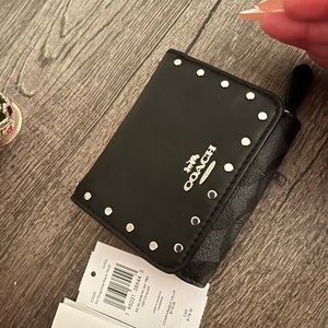 Coach mini wallet . Brand new never used . Perfect condition. None smoking home.